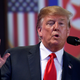 President Donald Trump answers press questions at a 2018 summit with North Korea leader Kim Jong Un.